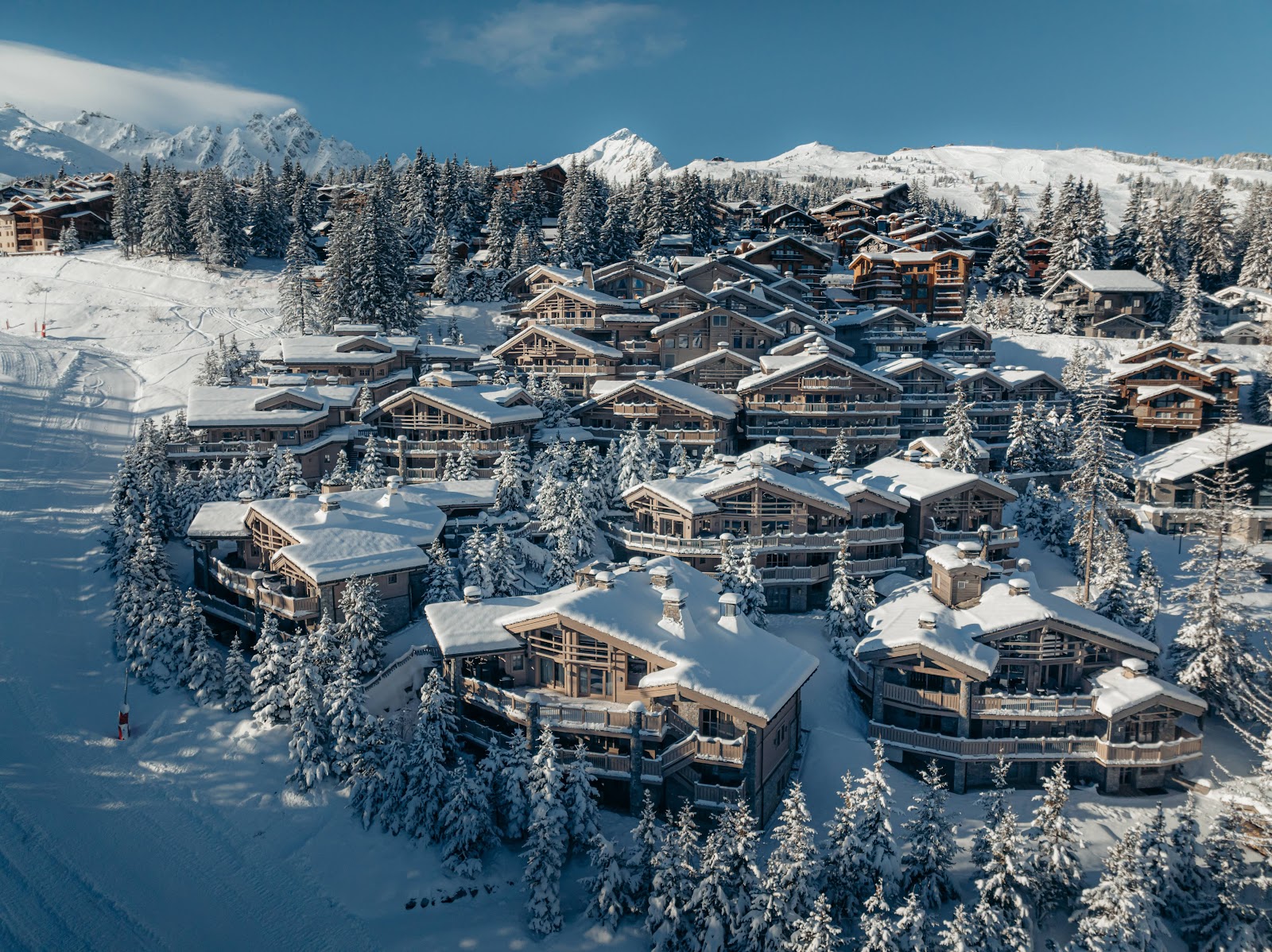 Chalet-style facade and snow at Le K2 Palace, Courchevel 1850