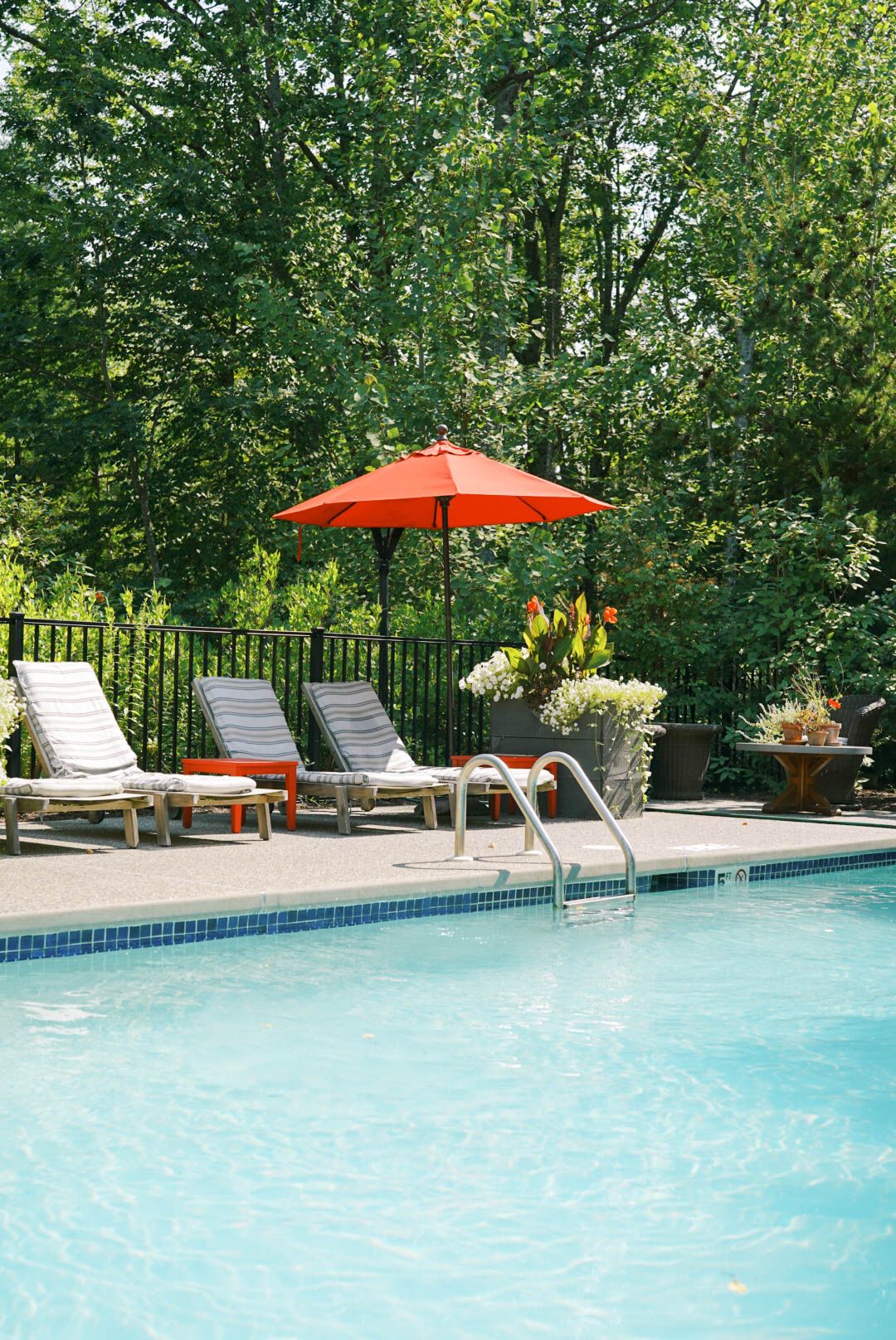 Pool and grounds at Hidden Pond