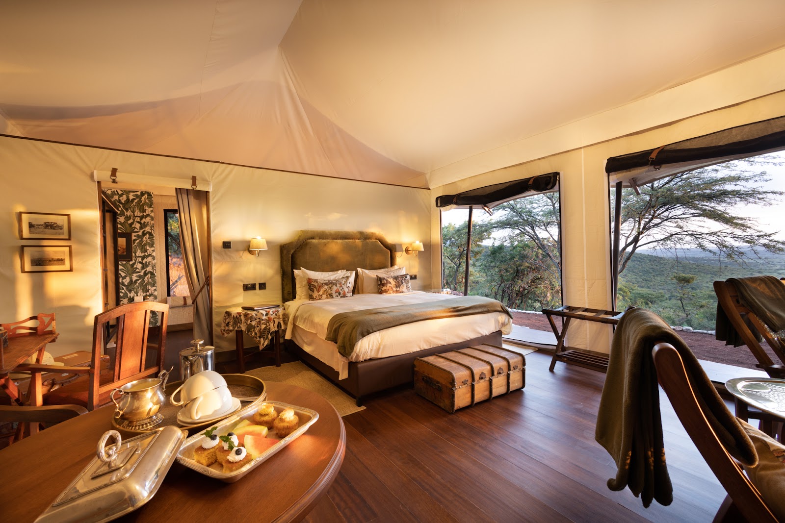 Canvas tented suite interior with campaign furniture and silver tea service at Cottar's 1920s Camp, Olderkesi, Masai Mara, Kenya