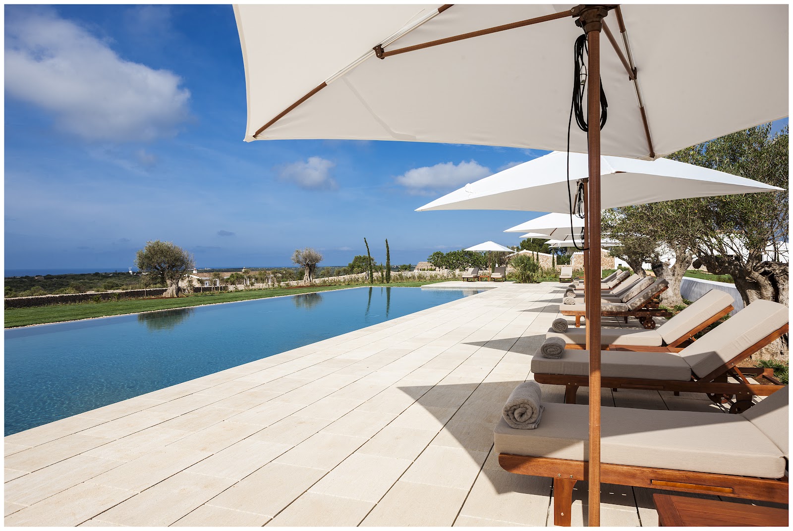 Terrace and gardens at Torralbenc, the Menorcan finca hotel near Cala'n Porter