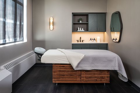 Spacious guest room with deep soaking tub at Hotel Ivy Minneapolis